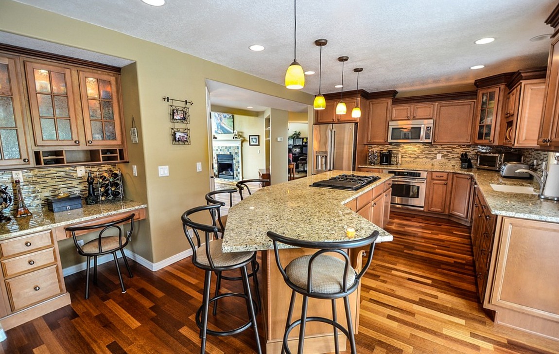 Image of a Kitchen with center island inside a home.